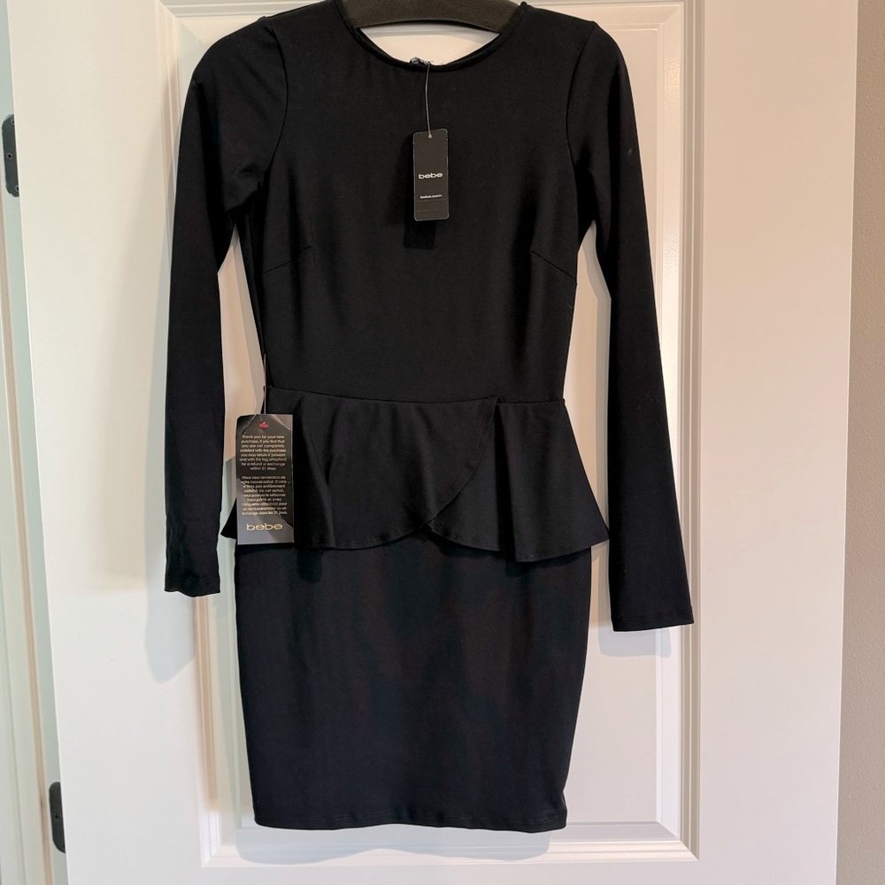 Bebe Peplum Black Dress. NWT. Size Small